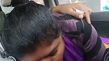 Telugu woman gives a desi blowjob to her man in a car