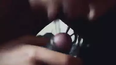 Slim girlfriend smiling while giving handjob and blowjob